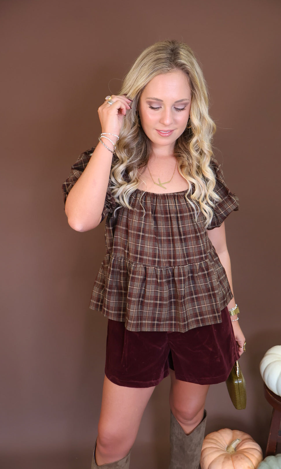 Brown Plaid Puff Sleeve Babydoll Top — full outfit with burgundy shorts.