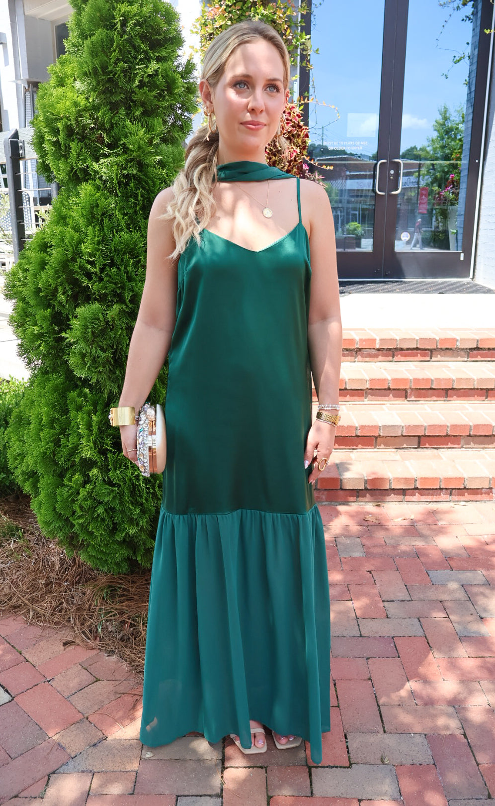 Emerald green satin slip maxi dress with adjustable straps and a detachable neck scarf
