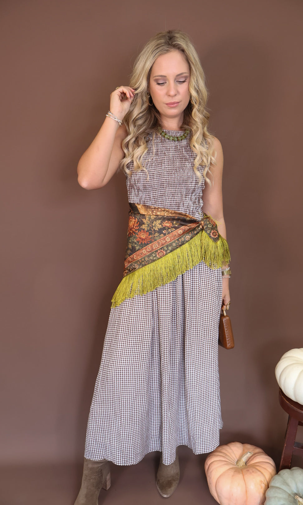 Green Deer Print Fringe Square Scarf — worn at the waist over a gingham dress.