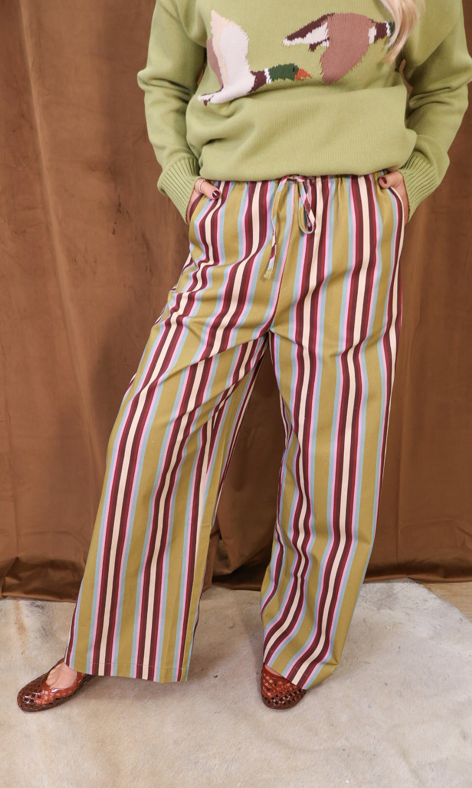 Multicolor Striped Wide Leg Pants — front view with side pockets.