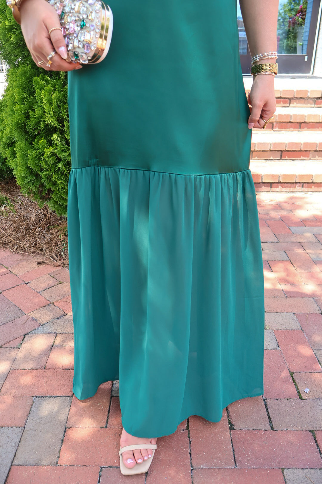 Emerald green satin slip maxi dress with adjustable straps and a detachable neck scarf