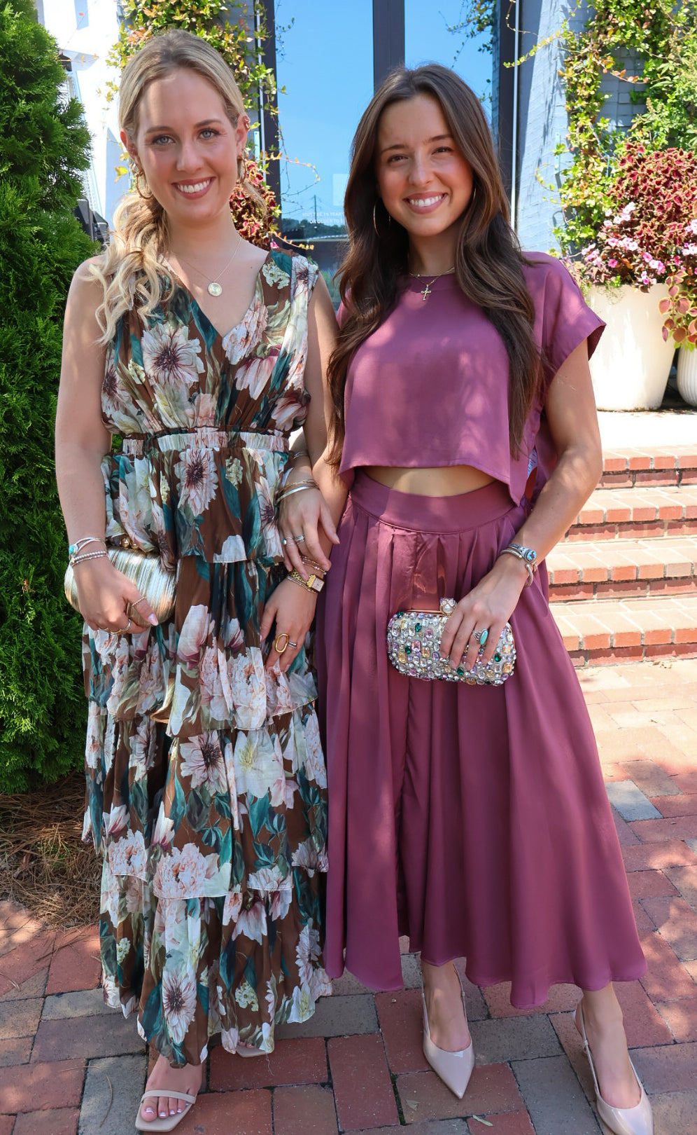 Brown floral tiered maxi dress with a V-neck and ruffled skirt