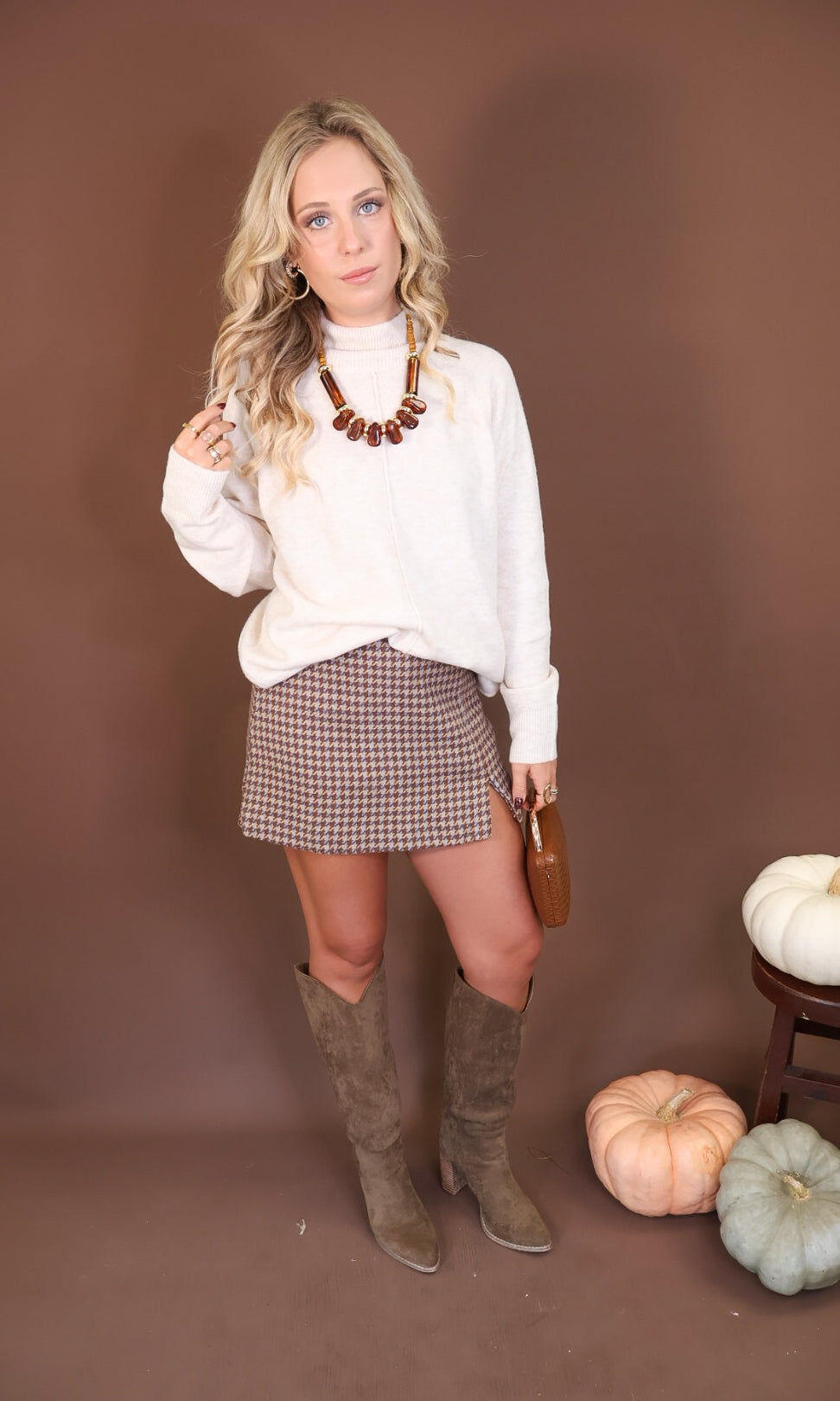 Oatmeal Mock Neck Tunic Sweater — full outfit with a checked mini skort.