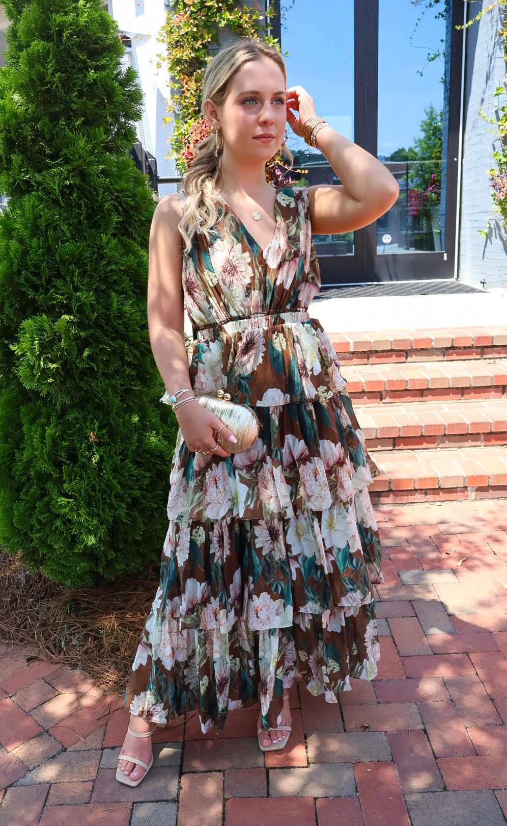Brown floral tiered maxi dress with a V-neck and ruffled skirt