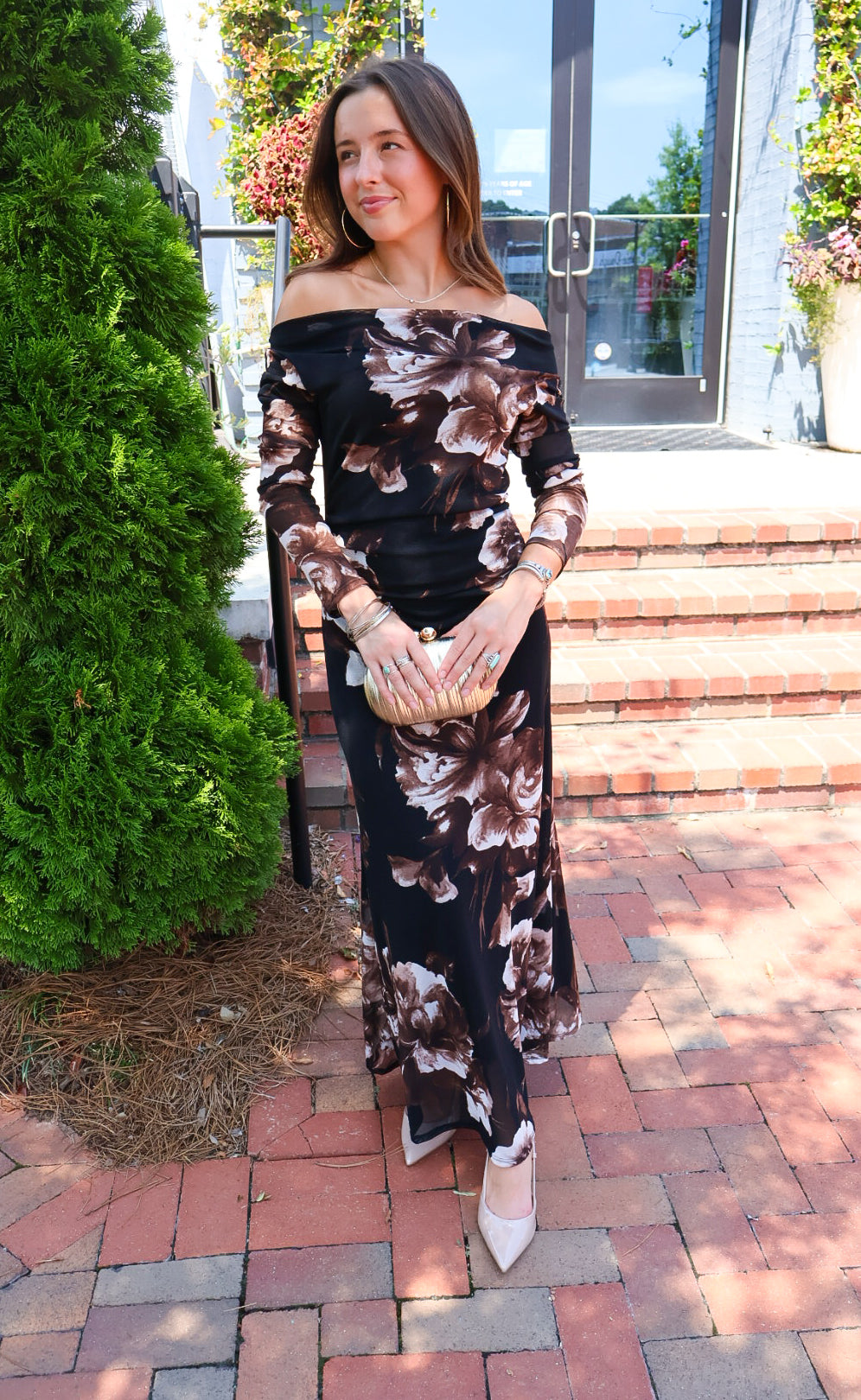 Black and brown floral off-the-shoulder maxi dress with long sheer sleeves