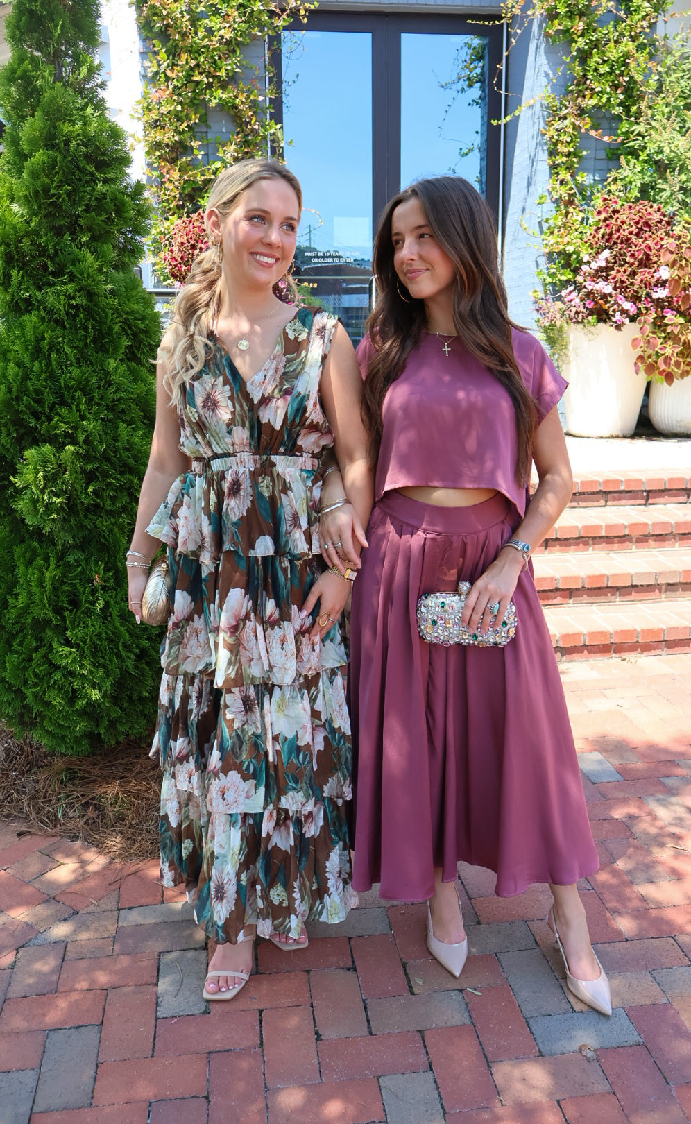 Mauve satin two-piece set with a boxy crop top and pleated midi skirt