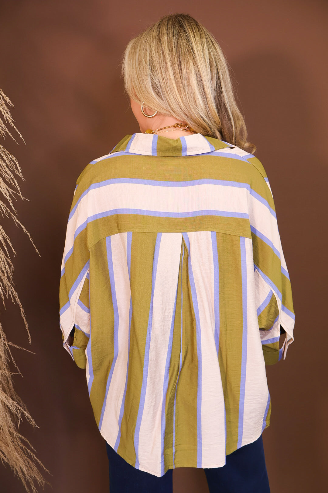 Model wearing the Olive & Blue Striped Button Down Top from Moda Boutique