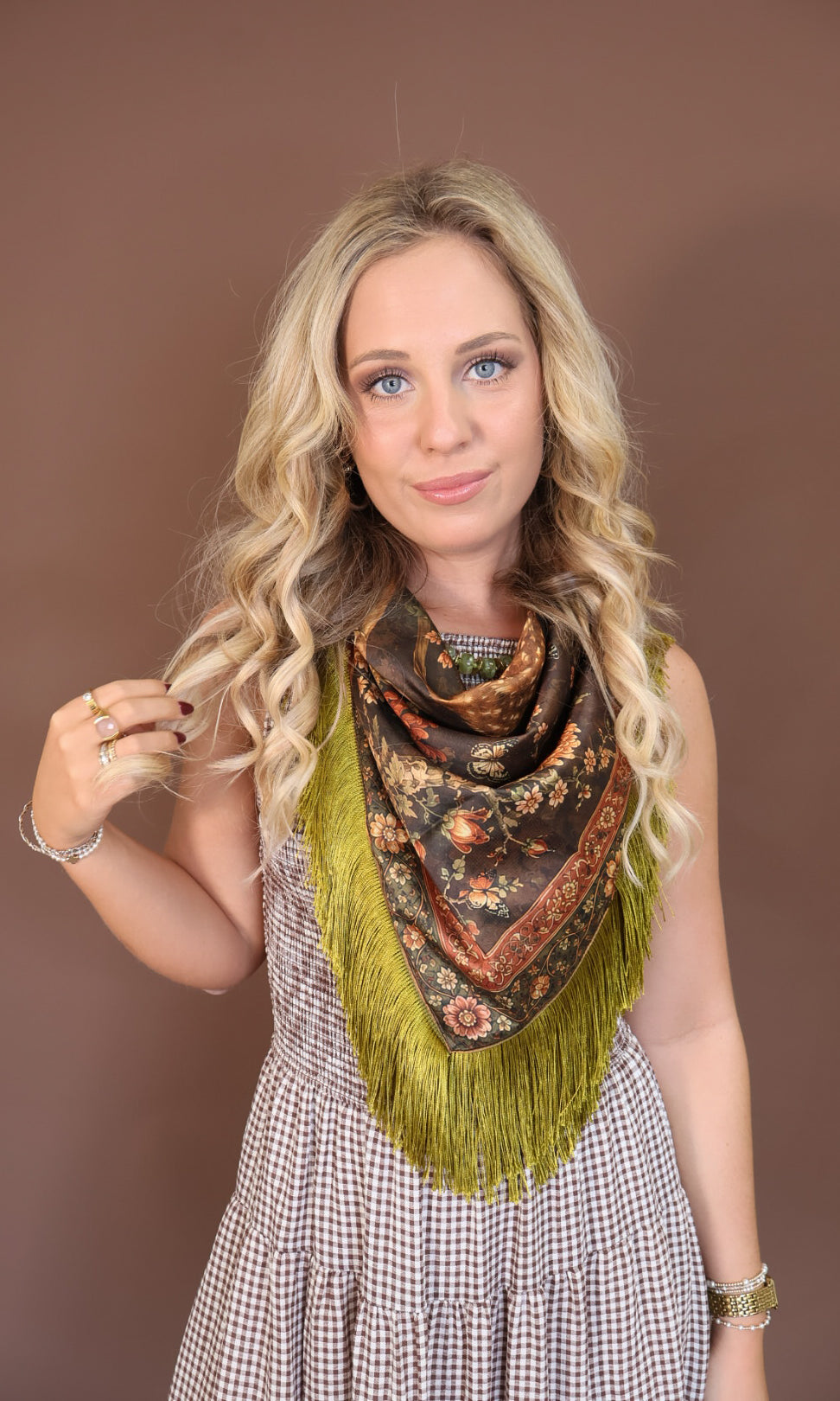 Green Deer Print Fringe Square Scarf — tied at the neck.