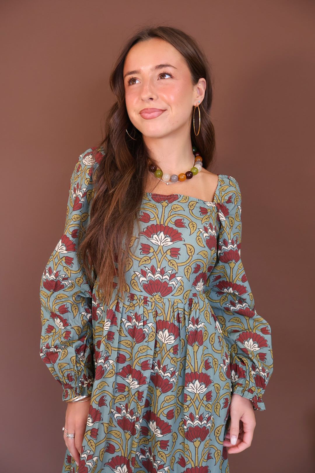 Sage And Burgundy Floral Long Sleeve Maxi Dress — close-up of square neckline.