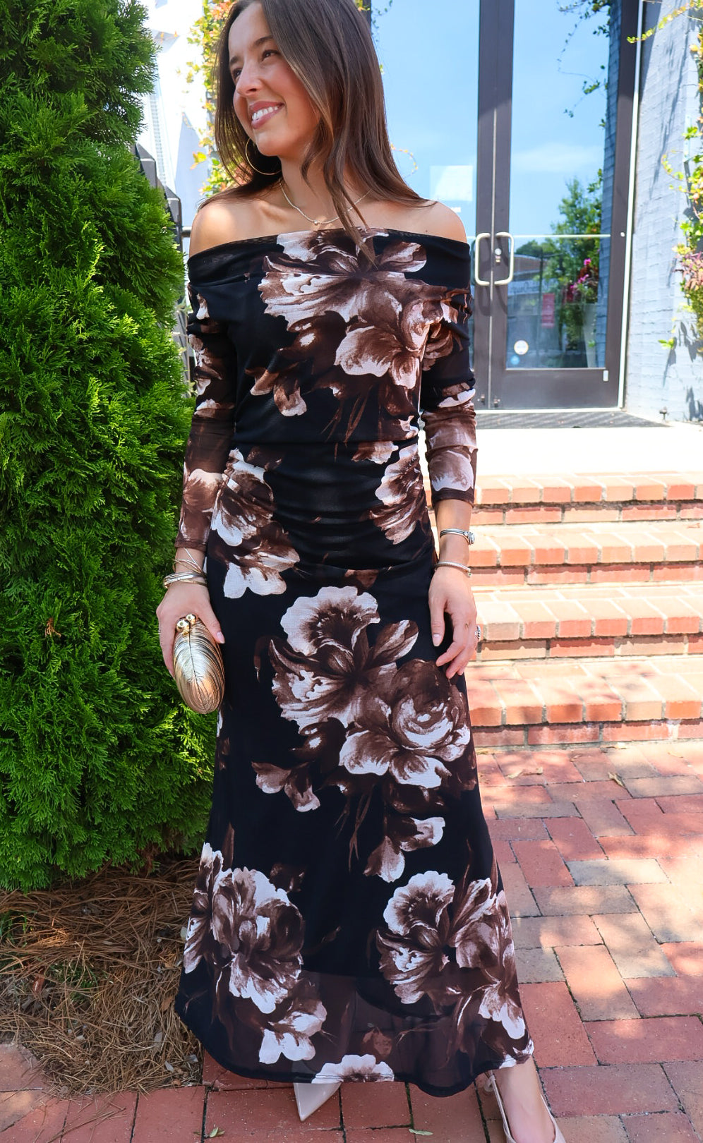 Black and brown floral off-the-shoulder maxi dress with long sheer sleeves