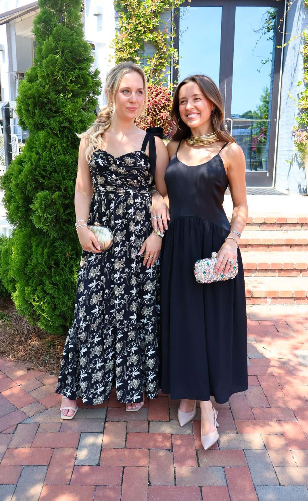 Black maxi dress with gold floral embroidery and ribbon shoulder ties