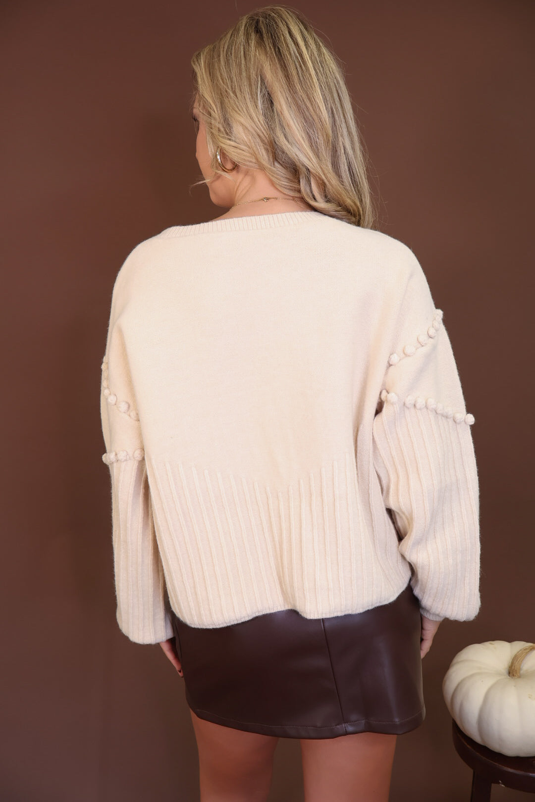 Cream Pom Pom Knit Cardigan — back view.