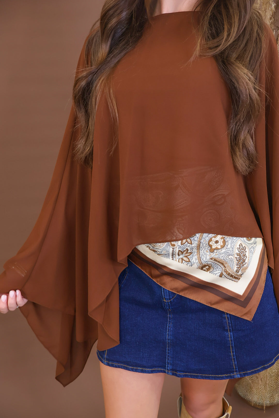 Chocolate sheer batwing poncho top layered over included cami