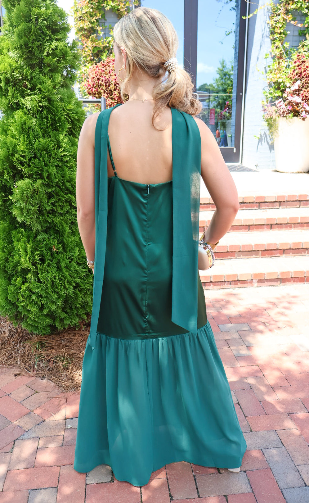 Emerald green satin slip maxi dress with adjustable straps and a detachable neck scarf