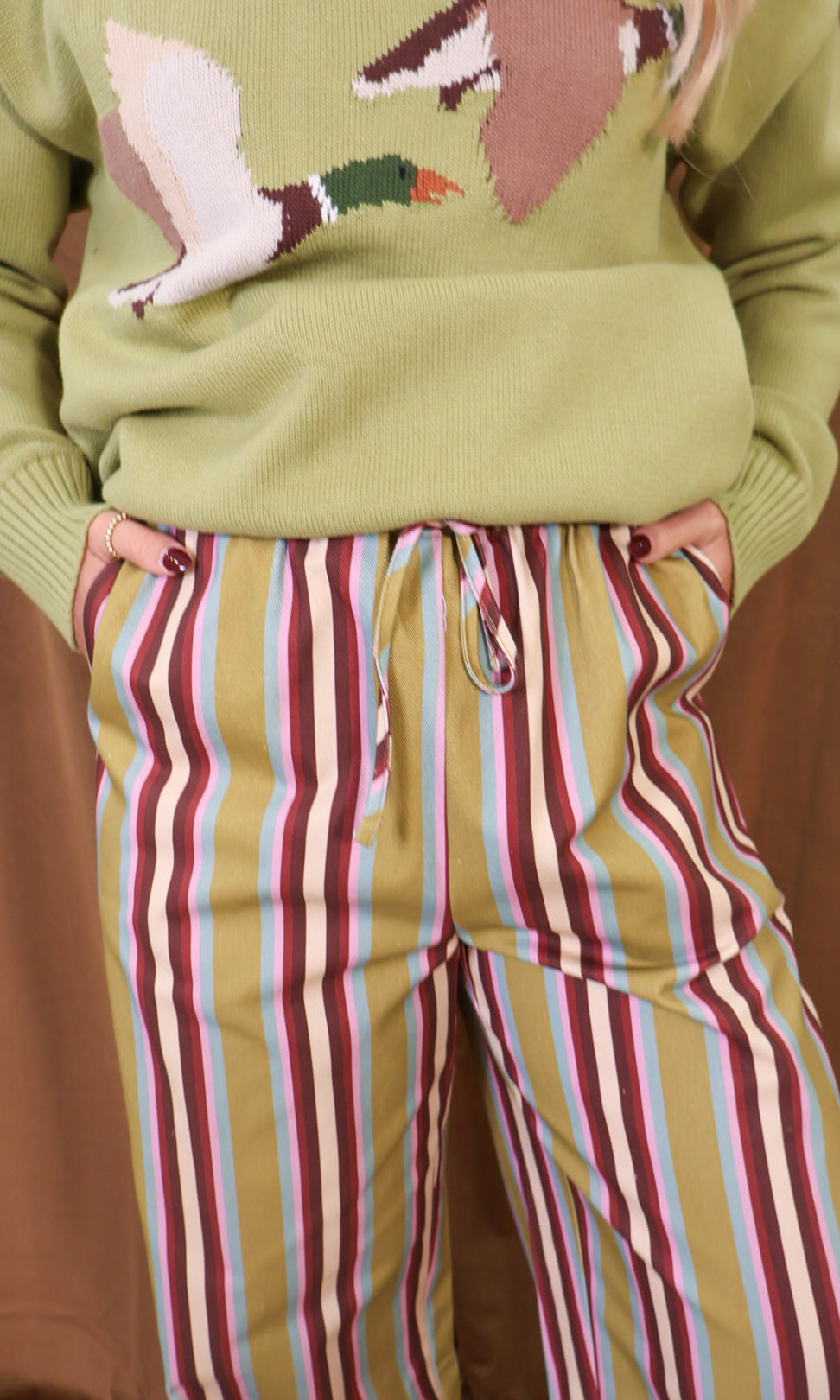 Multicolor Striped Wide Leg Pants — close-up of drawstring waistband.