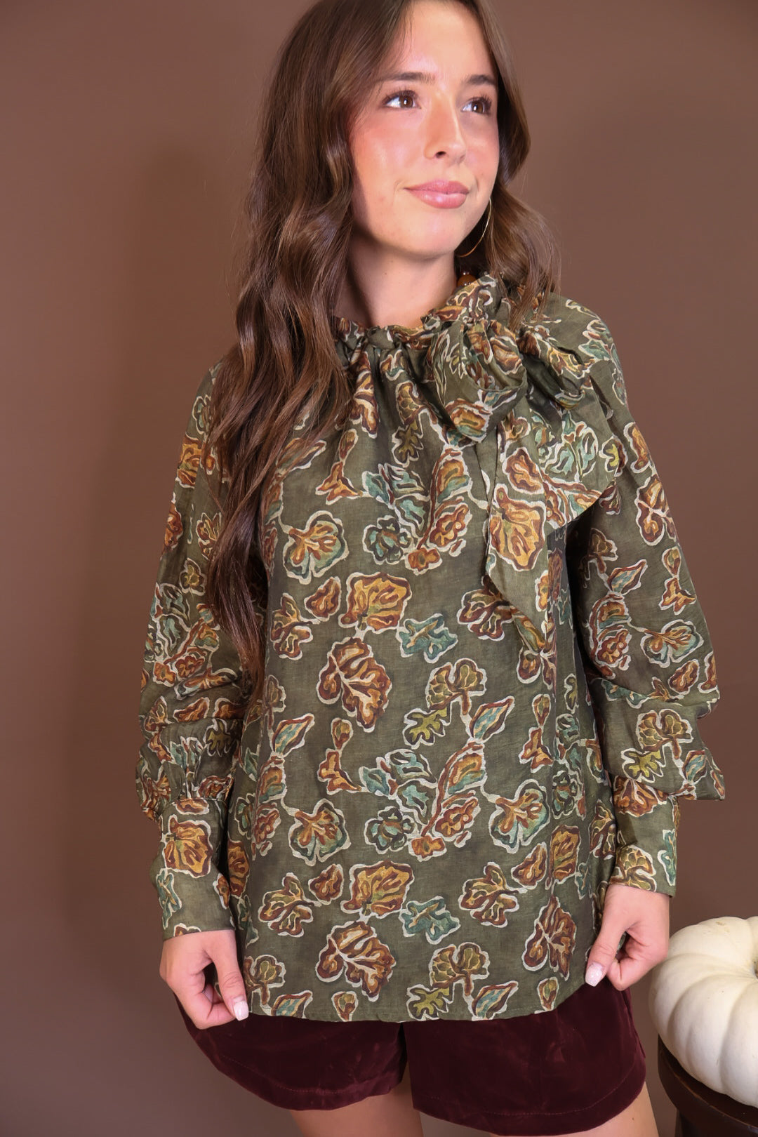 Olive Floral Tie-Neck Blouse — front view with ties hanging loose.
