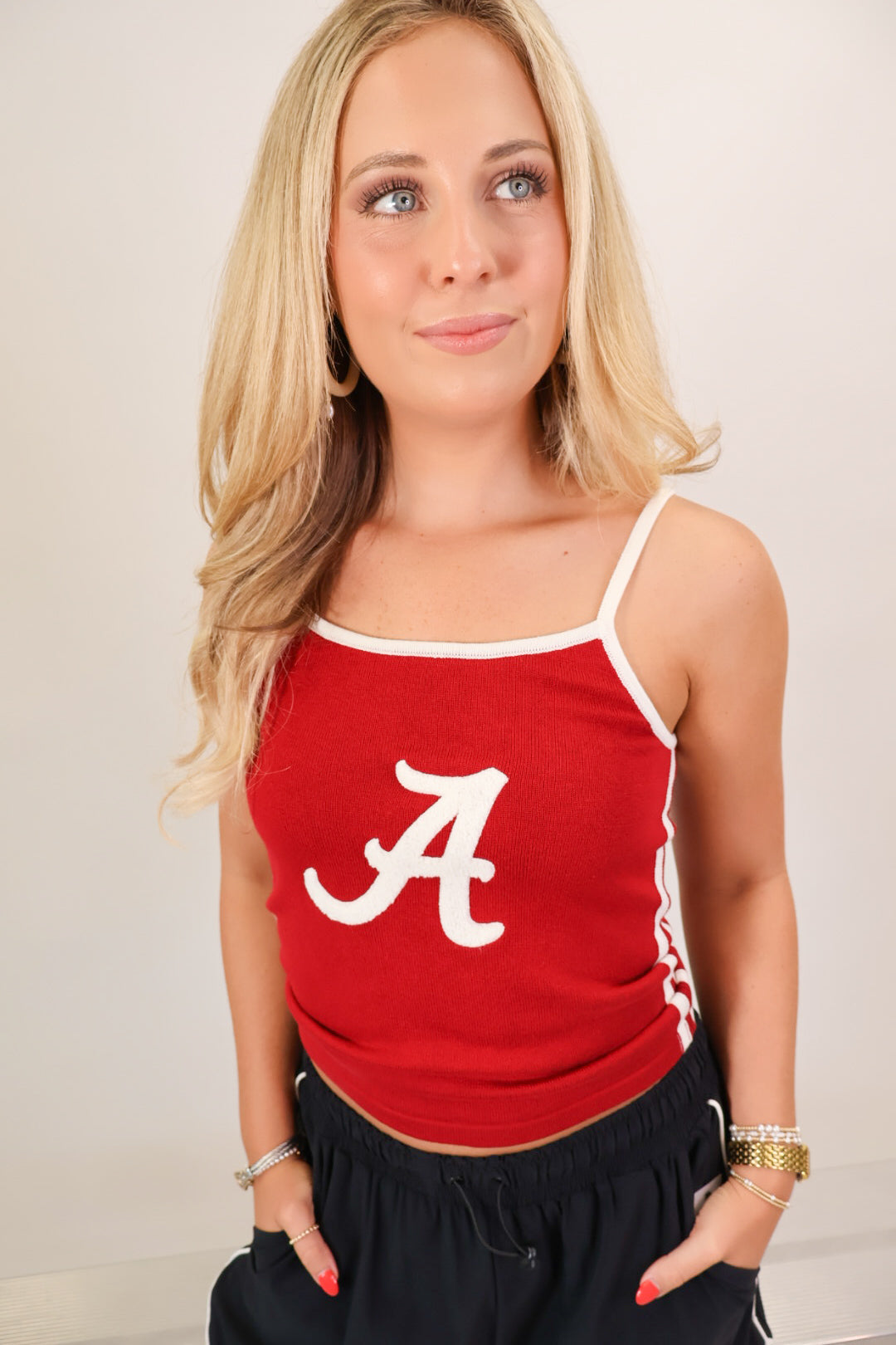 Crimson knit tank top with white script A and adjustable straps — view 3