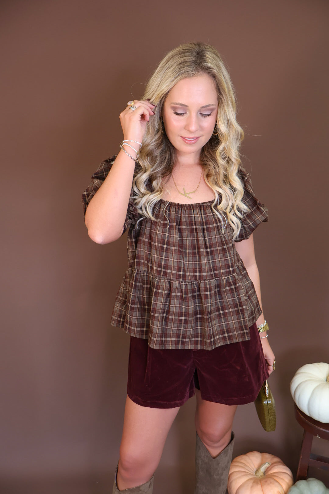 Brown Plaid Puff Sleeve Babydoll Top — full outfit with burgundy shorts.