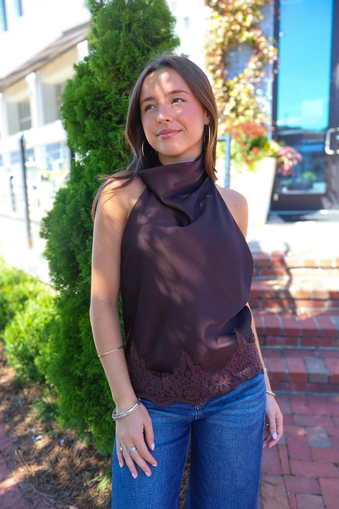 Brown Satin Backless Lace Trim Halter Top — front view with jeans.
