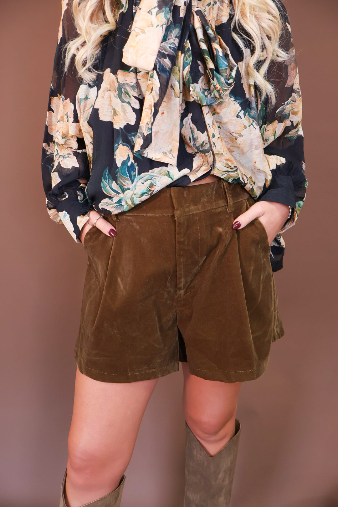 Olive Brushed Velvet Trouser Shorts — front view styled with a floral blouse.