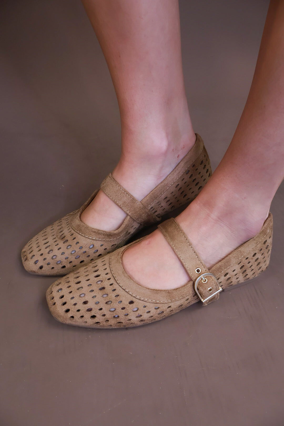 Model wearing the Brown Flat Mary Janes from Moda Boutique
