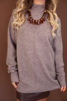 Mocha Mock Neck Tunic Sweater — close-up of mock neckline and knit.