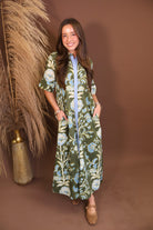 Model wearing the Olive Blue Floral Midi Dress from Moda Boutique