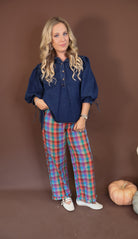 Dark Denim Balloon Sleeve Top — full outfit with plaid pants.