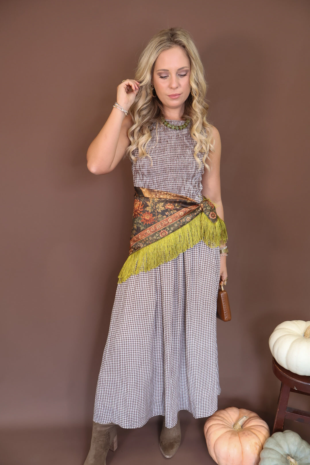 Green Deer Print Fringe Square Scarf — worn at the waist over a gingham dress.