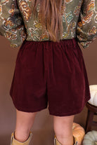 Burgundy Brushed Velvet Trouser Shorts — back view showing elasticated waistband.