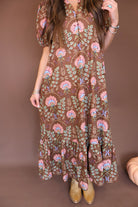 Brown Floral Eyelet Midi Dress — close-up of eyelet skirt and flounced hem.