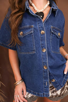 Model wearing the Dark Denim Button Up Shirt from Moda Boutique