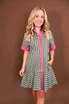 Model wearing the Olive Striped Button Front Dress from Moda Boutique