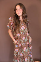 Brown Floral Eyelet Midi Dress — front view.