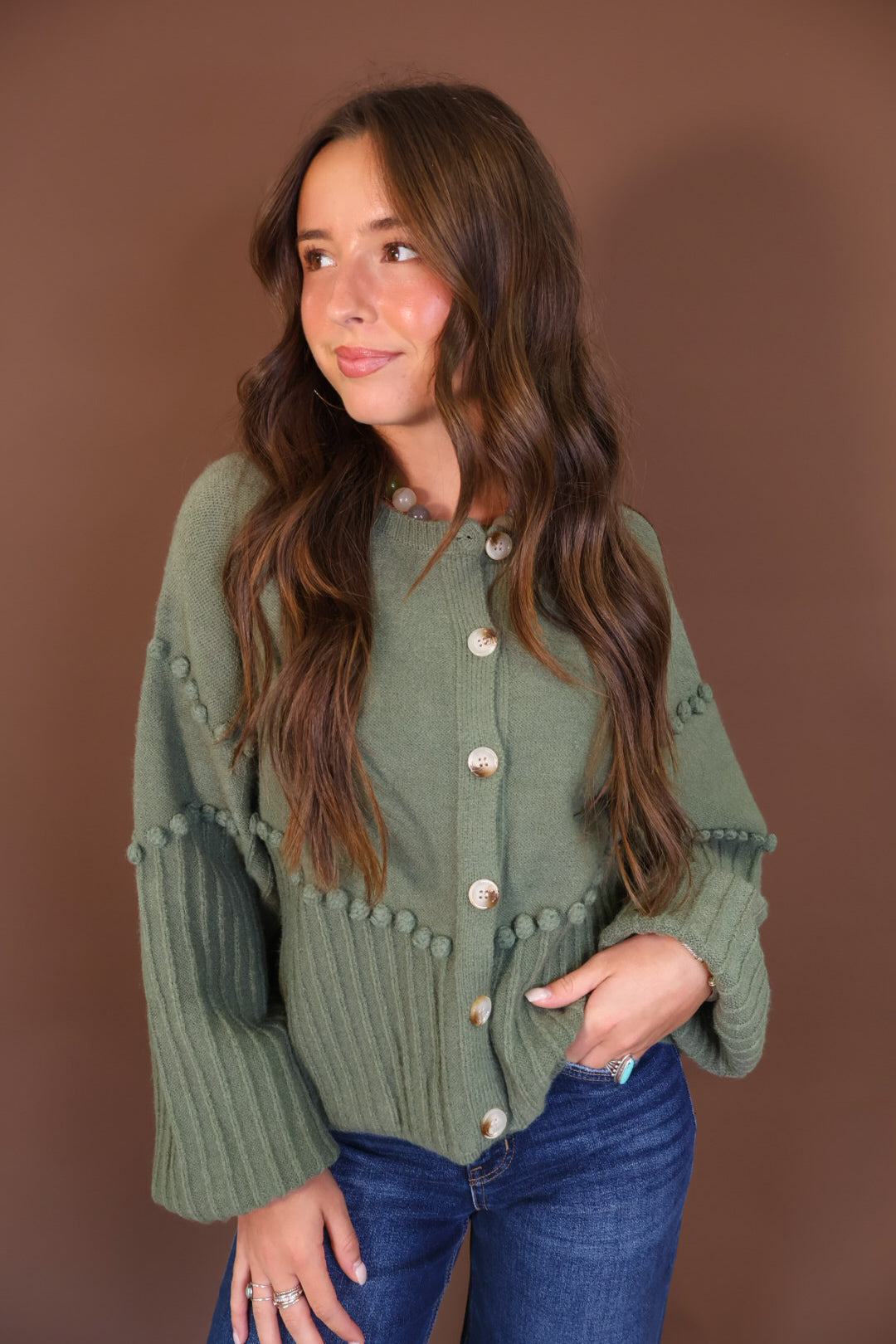 Olive Pom Pom Knit Cardigan — front view.