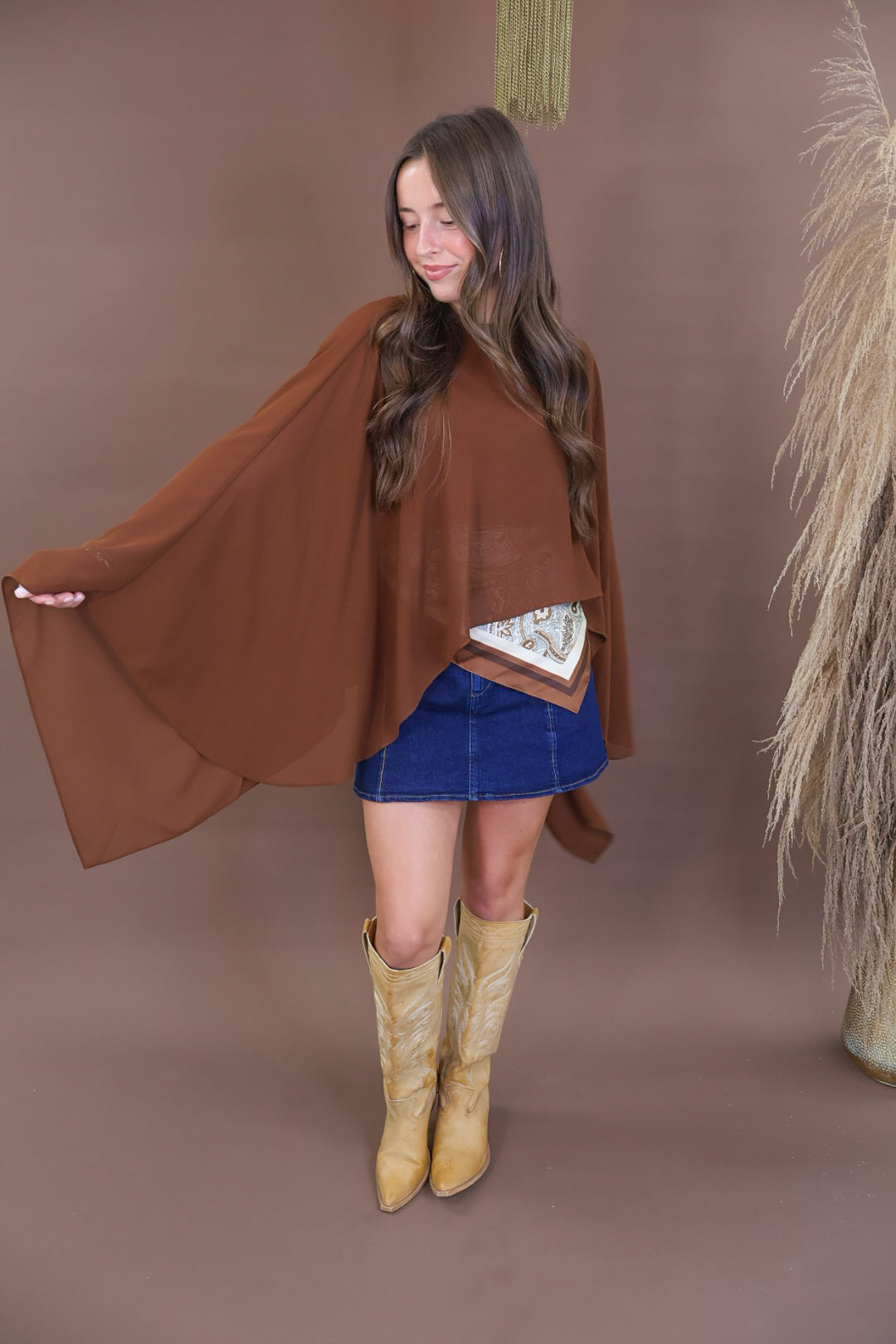 Chocolate sheer batwing poncho top layered over included cami