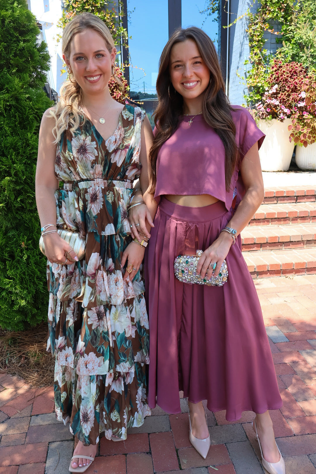 Brown floral tiered maxi dress with a V-neck and ruffled skirt