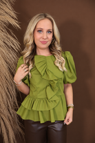 Model wearing the Martini Ruffle Top from Moda Boutique