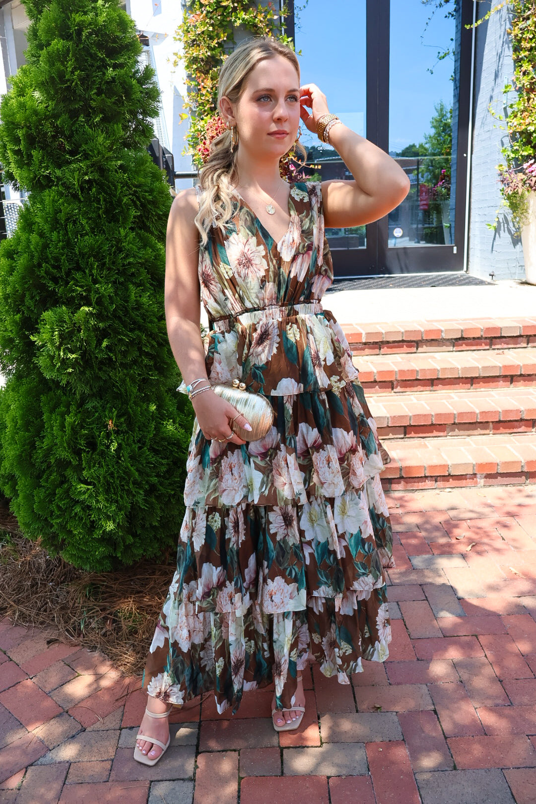Brown floral tiered maxi dress with a V-neck and ruffled skirt