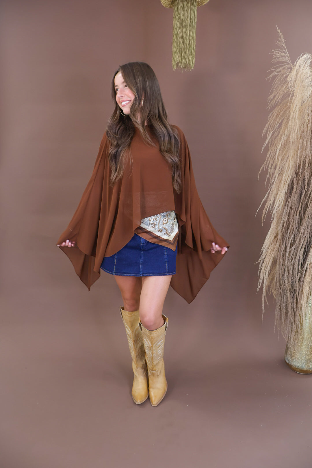 Chocolate sheer batwing poncho top layered over included cami