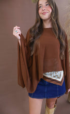 Chocolate sheer batwing poncho top layered over included cami