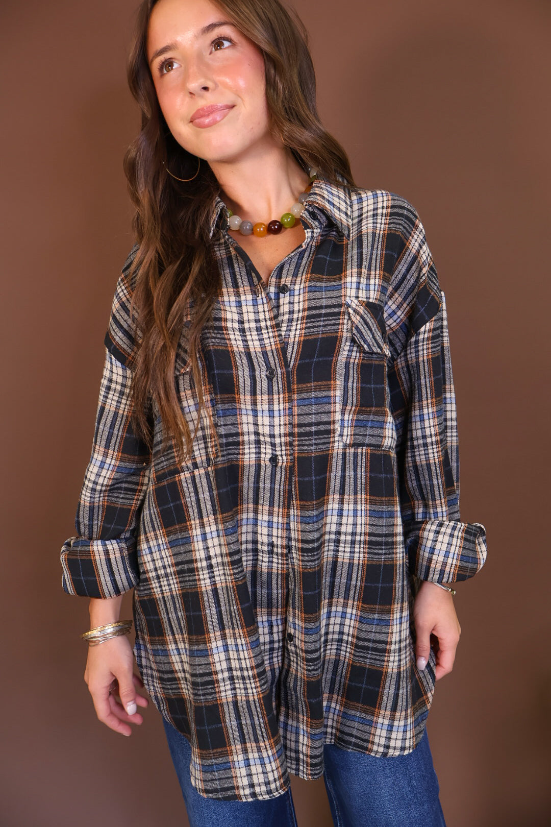 Plaid Button-Front Tunic Top — front view with rolled sleeves.