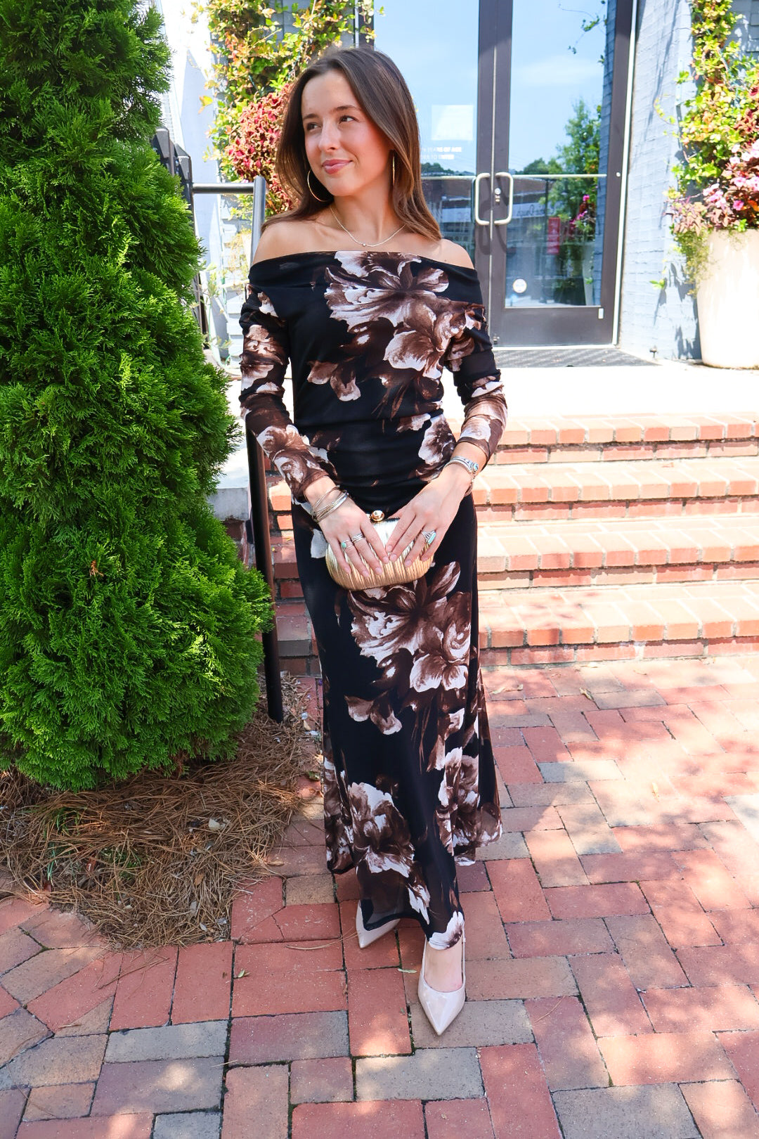 Black and brown floral off-the-shoulder maxi dress with long sheer sleeves