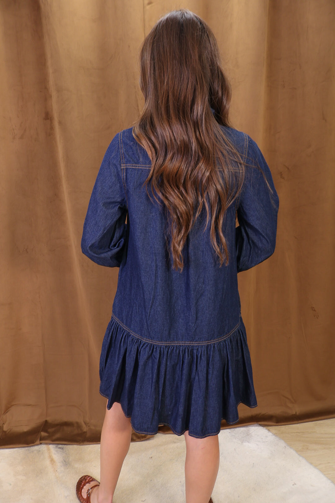 Dark Denim Tie-Neck Babydoll Dress — back view.