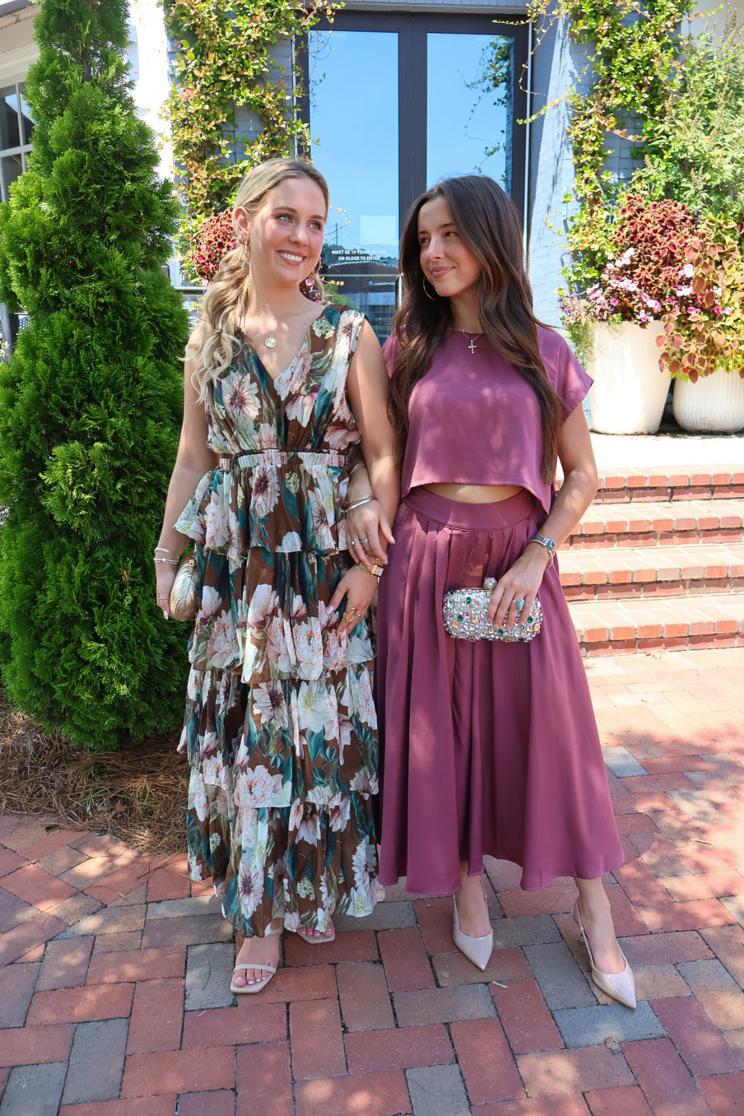 Mauve satin two-piece set with a boxy crop top and pleated midi skirt