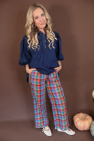 Multicolor Plaid Ruffle Hem Pants — full outfit with a navy top.
