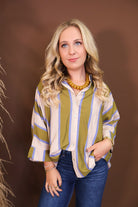 Model wearing the Olive & Blue Striped Button Down Top from Moda Boutique