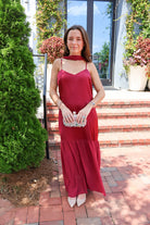 Burgundy satin slip maxi dress with adjustable straps and a detachable neck scarf