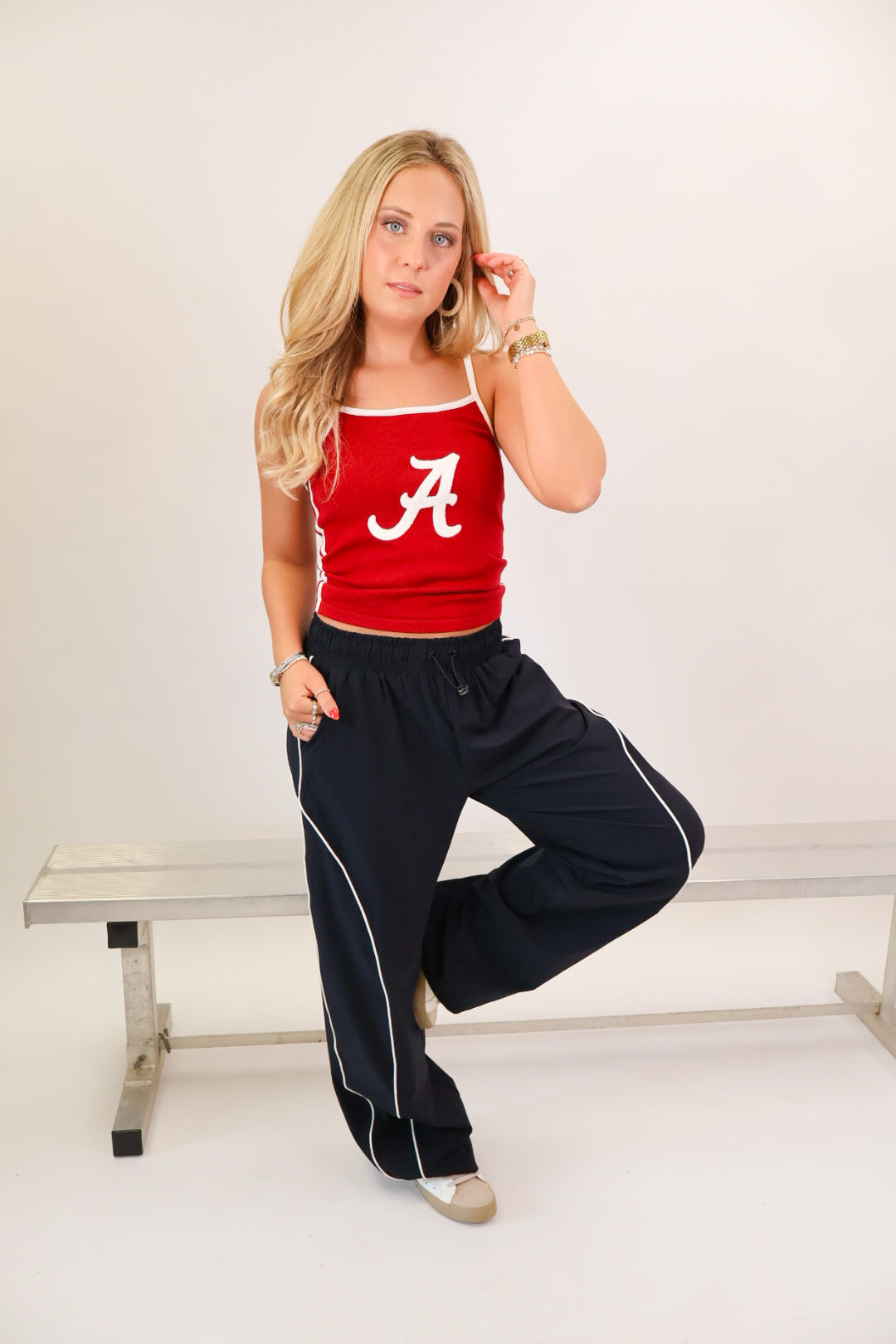 Black track pants with white side piping and drawstring waist — view 4