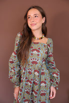 Sage And Burgundy Floral Long Sleeve Maxi Dress — close-up of square neckline.